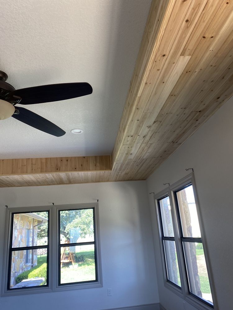 After Cedar shiplap ceiling installation before and after by First Stop Renovations